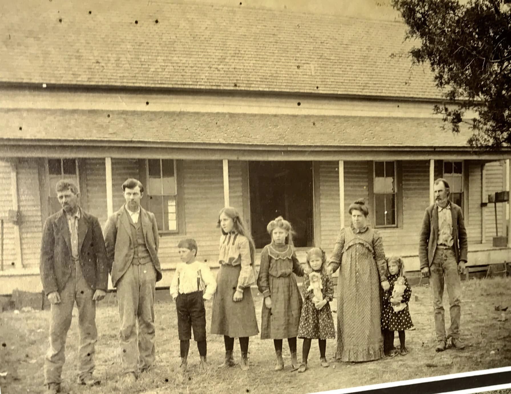 W.W. Tollett family in front of the original McClendon homeplace, circa 1898