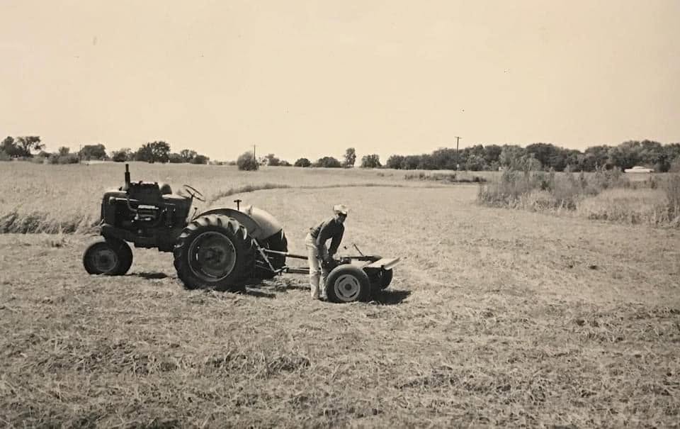 Antique photo of the McClendon family cutting hay
